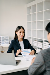business people and lawyers discussing contract papers sitting at the table. Concepts of law, advice, legal services. in morning light