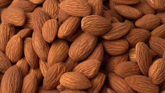 Closeup of a bunch of spinning organic almonds