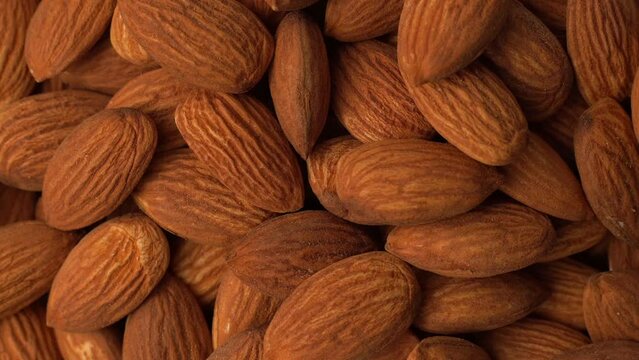 Closeup of a bunch of spinning organic almonds