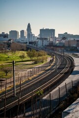 Scenic view of two railway tracks on the background of Los Angeles skyline