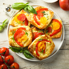 Homemade pastry with tomato and cheese