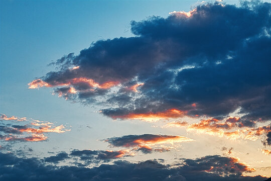 Clouds that turn warm orange when the sunsets.