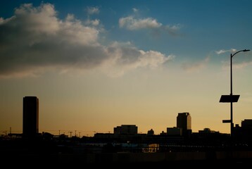 Fototapeta na wymiar Silhouette of the buildings of downtown Los Angeles at sunset.