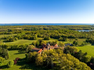 Aerial view over a large seminary and retreat on Long Island, New York on a sunny day