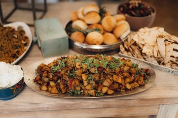 Beautiful wedding table setup with delicious food.