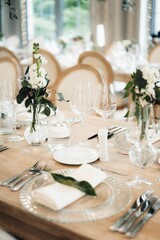 Beautiful wedding table setup with vibrant floral decorations.