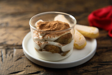 Traditional homemade tiramisu served in a glass