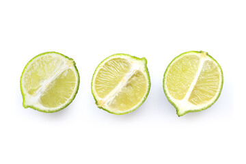 Ripe limes on white background.