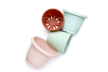 Plastic plant pots, containers on white background.