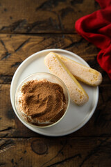 Traditional homemade tiramisu served in a glass