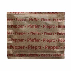 individual pepper sachet isolated over white - obrazy, fototapety, plakaty