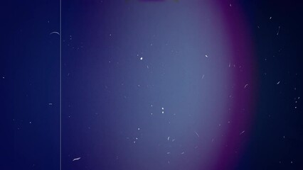 Vintage looping film strip background. 4K reel clutter old tv grain noise frame. Videotape texture overlay with scratches and dirt stains. Lens flare light leaks effect - Powered by Adobe