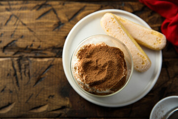 Traditional homemade tiramisu served in a glass