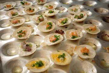 Close up of Bánh Khọt. Bánh khọt is a popular type of cake in southern Vietnam, particularly in Bà Rịa-Vũng Tàu province.