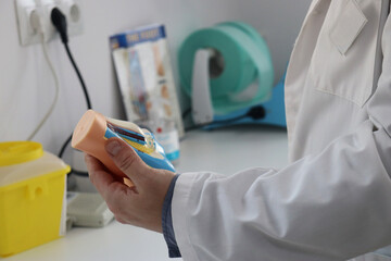 Podiatrist pointing to the parts of the foot