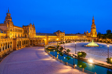 Fototapeta na wymiar Seville, Andalusia, Spain: Plaza de spana, Spanish Square at twilight; blue hour cityscape