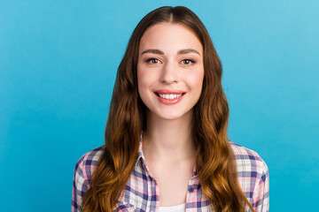 Fototapeta premium Close-up of happy professional positive girl toothy smiling at camera isolated blue background