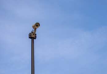 Camera on the public road. Surveillance with security cameras on the street for the safety of citizens.