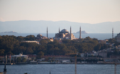 Hagia Sophia in Istanbul's Old City, with Golden Horn in foreground and Marmara Sea in background -...