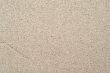 Fototapeta na wymiar Cardboard texture. Brown cardboard background. Blank cardboard with surface texture. Brown cardboard sheet of paper