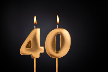 Golden candle 40 with flame - Birthday card on dark luxury background