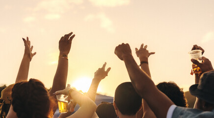 Unified by music: Crowd celebrating at a summer festival