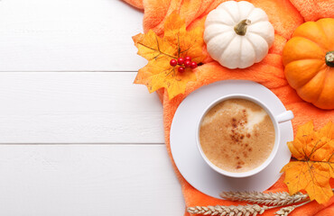 Autumn background with coffee latte and pumpkins