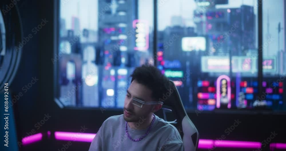 Poster establishing shot: cyberpunk futuristic city behind a window switches to a young handsome man workin