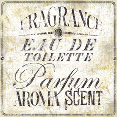 Vintage decorative typo collage with graphic elements on a grunge textured  background containing the following words fragrance, eau de toilette, parfum, aroma and scent