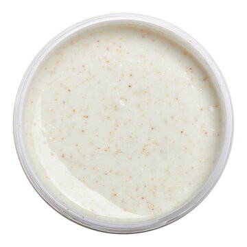 White cream cleanser scrub peeling texture isolated on white background. Skin care gentle exfoliation vegan cosmetic product creamy texture with organic particles for face and body