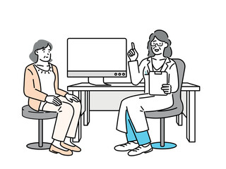 A woman being seen by a doctor in a hospital