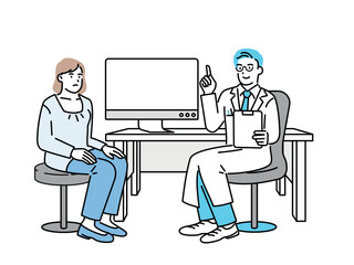 A woman being seen by a doctor in a hospital