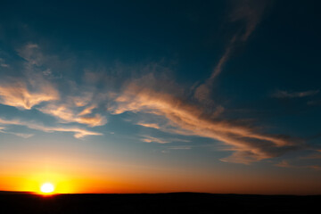 Natural landscape of beautiful sunset  or sunrise with clouds, dark blue sky.