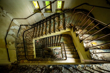 empty staircase in an abandoned building