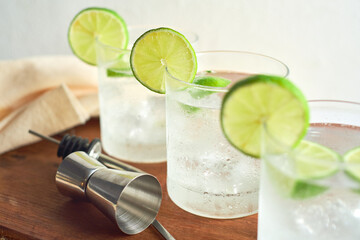 Three glasses of a freshly prepared gin and tonic