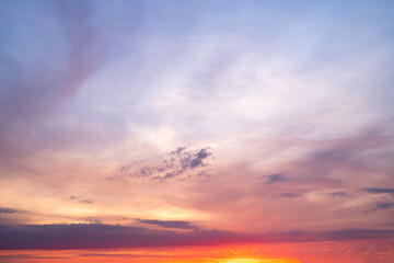 beautiful , luxury soft gradient orange gold clouds and sunlight on the blue sky perfect for the background, take in everning,Twilight