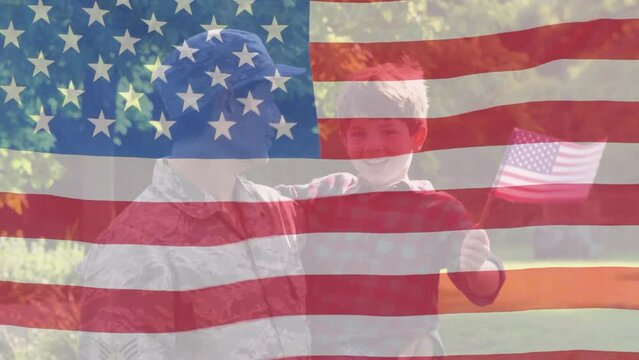 Animation of flag of america over caucasian soldier talking with son holding american flag