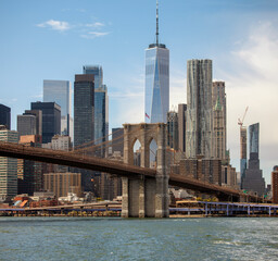 Famous downtown New York skyline Brooklyn Bridge and Manhattan in the morning sunlight 