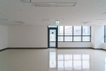 Photo of wall part with veranda doors and windows in empty office interior