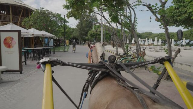 POV Riding a Carriage Horse as a Transportation in Gili Trawangan Island Indonesia