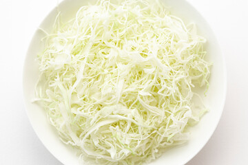 shredded cabbage on white background