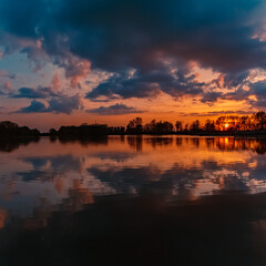Sunset with reflections near Plattling, Isar, Bavaria, Germany