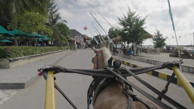 POV Riding a Carriage Horse as a Transportation in Gili Trawangan Island Indonesia