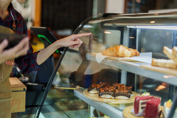 The owner is counting the number of bakeries from the tablet in his hand. Prepare orders for...