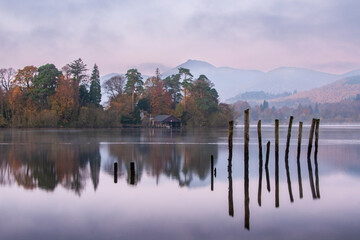 Old mooring posts by Derwentwater Island in the Lake District
