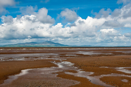 View across the sandstone beach of Solway Firth in Cumbria