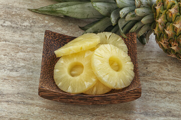 Marinated pineapple rings in the bowl