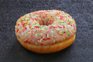 Sweet glazed vanilla donut with icing