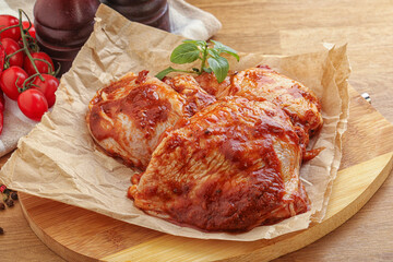 Marinated chicken leg in tomato sauce