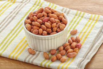 Raw peanut heap in the bowl